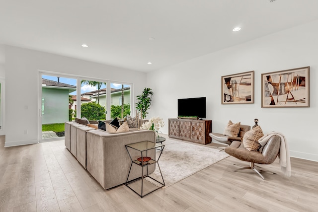 13330 Machiavelli Way, Palm Beach Gardens, FL 33418 - living room featuring light wood-type flooring, recessed lighting, and baseboards