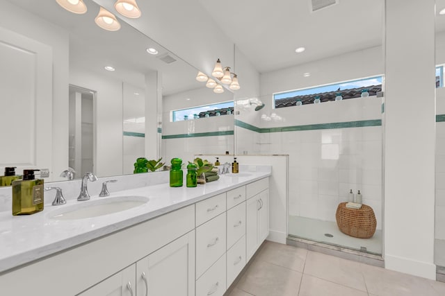 13330 Machiavelli Way, Palm Beach Gardens, FL 33418 - full bath featuring healthy amount of natural light, double vanity, a stall shower, tile patterned flooring, and recessed lighting