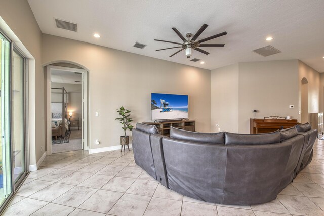 10295 SW Waterway Ln, Port Saint Lucie, FL 34987 - living area with a ceiling fan, light tile patterned floors, and recessed lighting