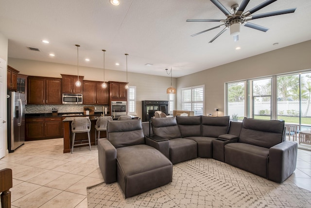 10295 SW Waterway Ln, Port Saint Lucie, FL 34987 - living area featuring light tile patterned floors, recessed lighting, and a ceiling fan