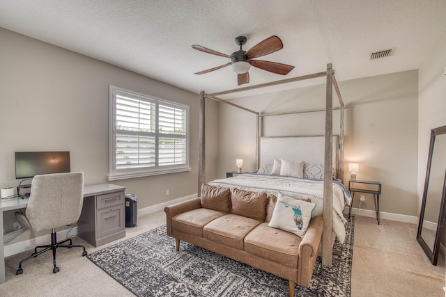 10295 SW Waterway Ln, Port Saint Lucie, FL 34987 - bedroom featuring light colored carpet, a desk, a textured ceiling, and a ceiling fan