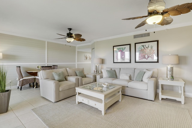 275 Palm Ave Unit A406, Jupiter, FL 33477 - living room featuring ceiling fan, light tile patterned flooring, crown molding, and a wainscoted wall