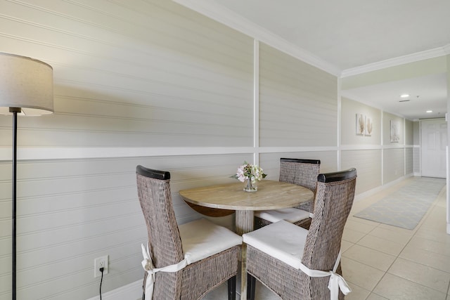 275 Palm Ave Unit A406, Jupiter, FL 33477 - dining space with tile patterned flooring and ornamental molding