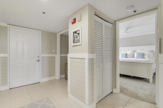 275 Palm Ave Unit A406, Jupiter, FL 33477 - corridor with light tile patterned floors and light colored carpet