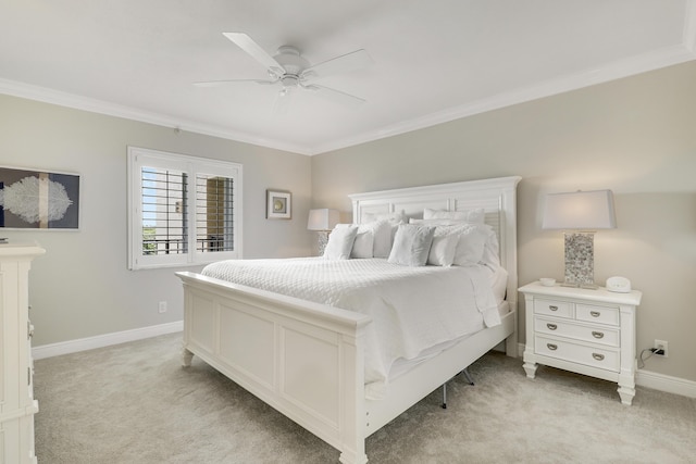 275 Palm Ave Unit A406, Jupiter, FL 33477 - bedroom featuring light carpet, ornamental molding, and a ceiling fan