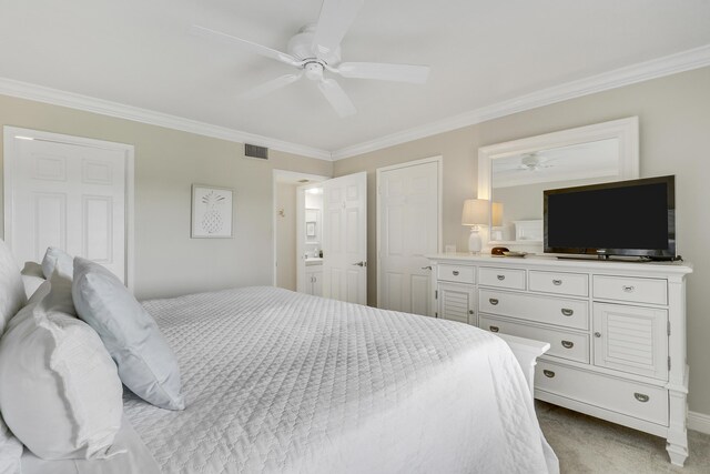 275 Palm Ave Unit A406, Jupiter, FL 33477 - carpeted bedroom with crown molding, a ceiling fan, and ensuite bathroom