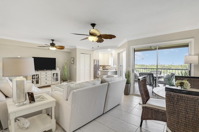 275 Palm Ave Unit A406, Jupiter, FL 33477 - living area featuring crown molding, light tile patterned floors, and ceiling fan