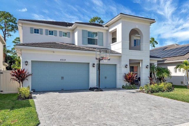 4019 Cascade Falls Cir, Lake Worth, FL 33467 - view of front of property with an attached garage, decorative driveway, a tile roof, and stucco siding
