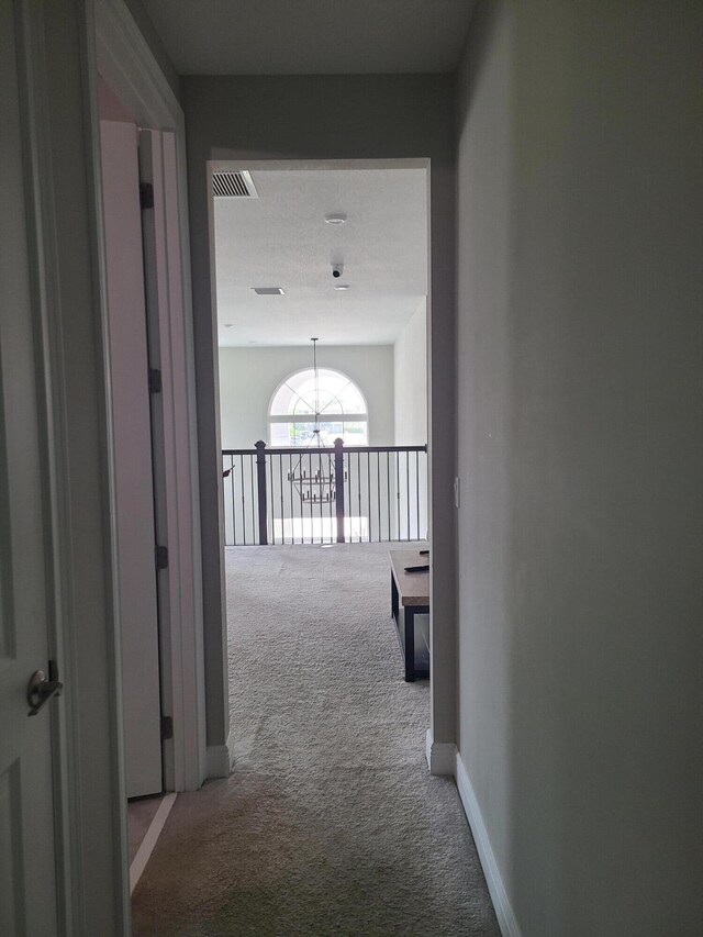 4019 Cascade Falls Cir, Lake Worth, FL 33467 - hall with carpet and a chandelier