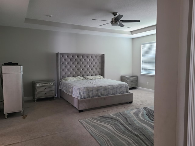 4019 Cascade Falls Cir, Lake Worth, FL 33467 - carpeted bedroom with a tray ceiling and ceiling fan