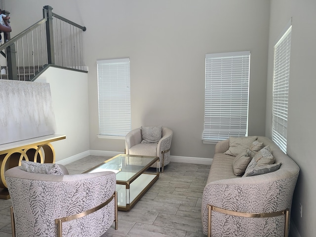 4019 Cascade Falls Cir, Lake Worth, FL 33467 - living area featuring a towering ceiling and wood finish floors