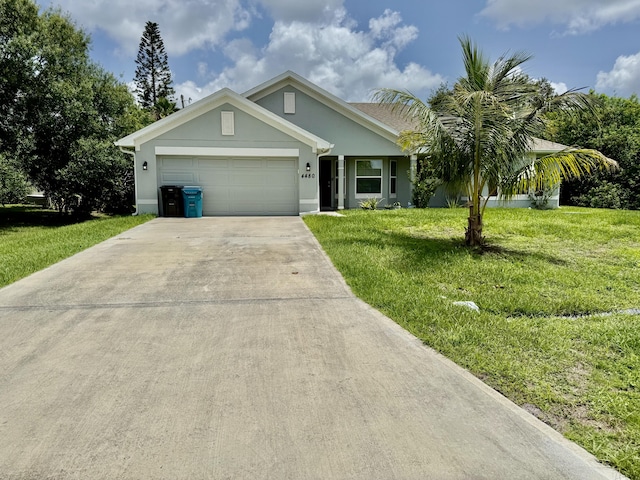 4480 SW Jaunt Rd, Port Saint Lucie, FL 34953 - ranch-style home featuring driveway, stucco siding, an attached garage, and a front lawn