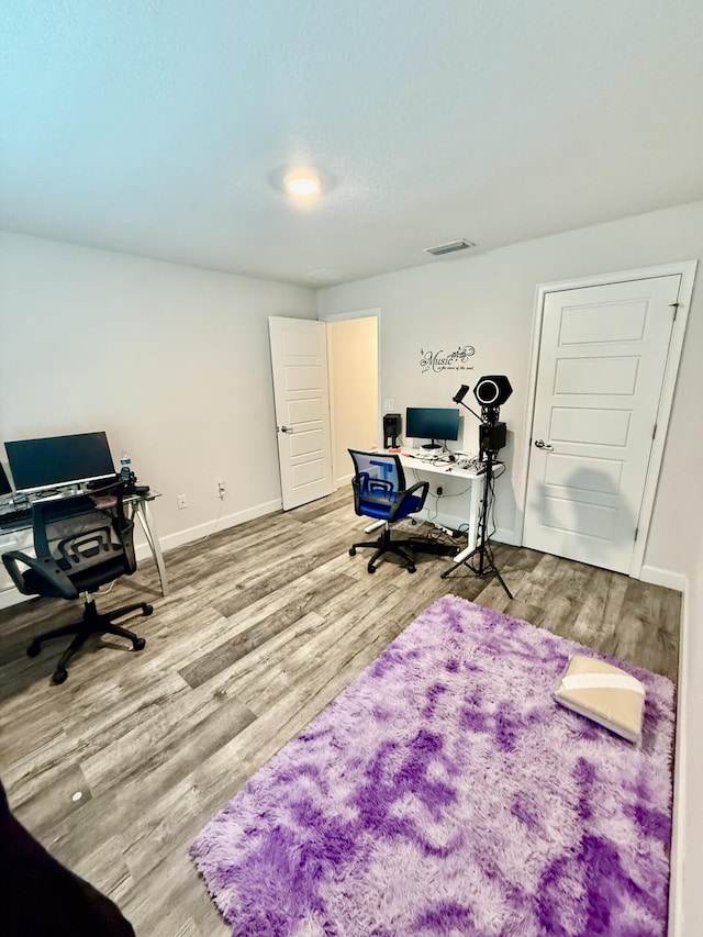 4480 SW Jaunt Rd, Port Saint Lucie, FL 34953 - home office featuring wood finished floors and baseboards