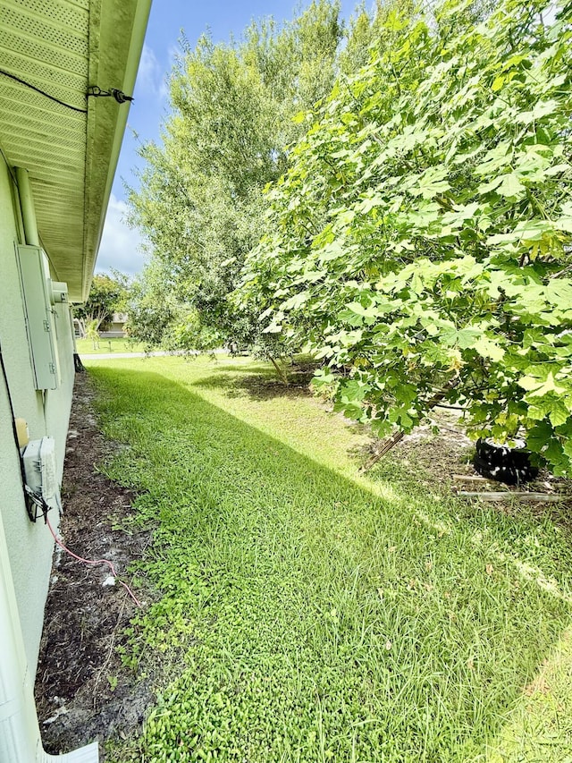 4480 SW Jaunt Rd, Port Saint Lucie, FL 34953 - view of green lawn