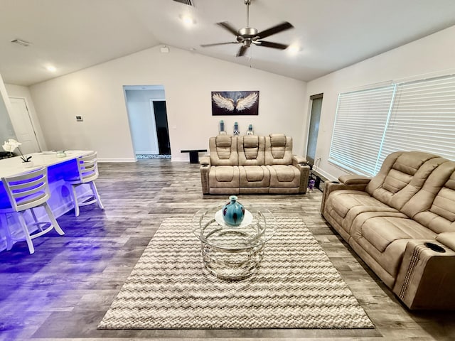 4480 SW Jaunt Rd, Port Saint Lucie, FL 34953 - living area with lofted ceiling, wood finished floors, ceiling fan, and baseboards