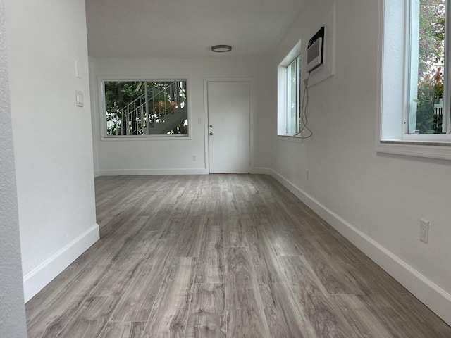 740 11th St Unit 3A, Miami Beach, FL 33139 - spare room featuring wood finished floors and baseboards