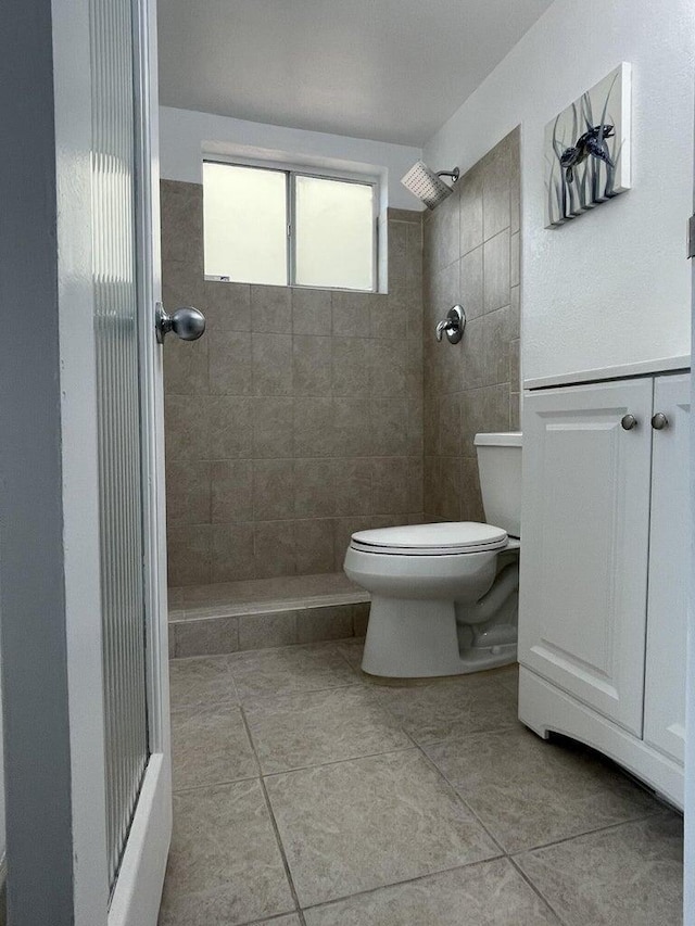 740 11th St Unit 3A, Miami Beach, FL 33139 - full bath with a shower stall, toilet, and tile patterned floors