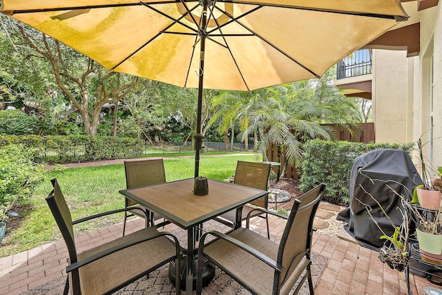 2788 Eagle Rock Cir Unit 3, West Palm Beach, FL 33411 - view of patio featuring outdoor dining area and area for grilling