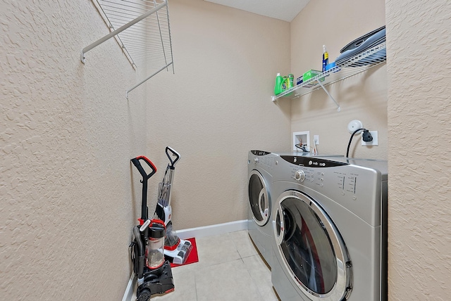 2788 Eagle Rock Cir Unit 3, West Palm Beach, FL 33411 - washroom with light tile patterned flooring and washer and dryer