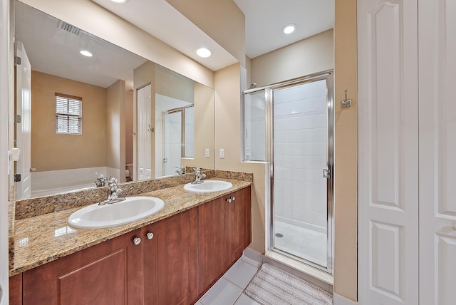 2788 Eagle Rock Cir Unit 3, West Palm Beach, FL 33411 - bathroom with a shower stall, double vanity, and tile patterned flooring