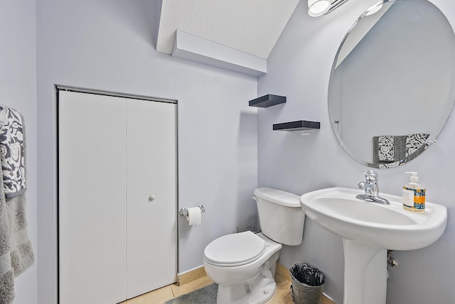 2788 Eagle Rock Cir Unit 3, West Palm Beach, FL 33411 - bathroom with toilet and tile patterned flooring
