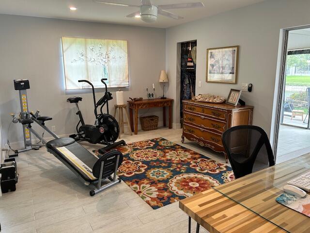 100 Lake Terry Dr, West Palm Beach, FL 33411 - workout area featuring a ceiling fan, recessed lighting, and wood finished floors
