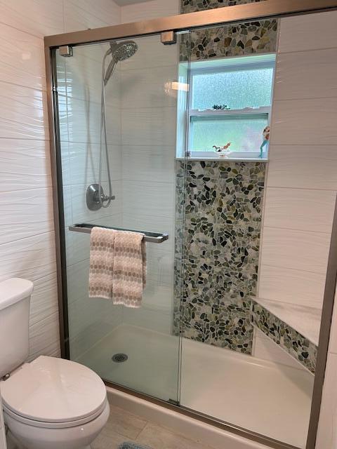 100 Lake Terry Dr, West Palm Beach, FL 33411 - full bathroom with toilet and a stall shower