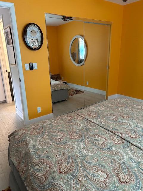 100 Lake Terry Dr, West Palm Beach, FL 33411 - bedroom with a closet and baseboards