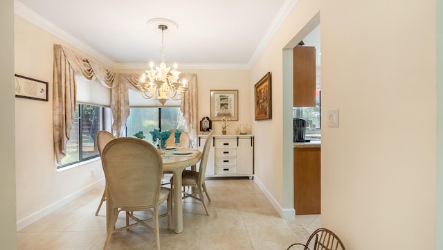21596 Magdalena Ter, Boca Raton, FL 33433 - dining room with a chandelier, light tile patterned flooring, plenty of natural light, crown molding, and baseboards