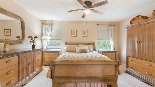 21596 Magdalena Ter, Boca Raton, FL 33433 - bedroom with light carpet, multiple windows, a textured ceiling, and a ceiling fan