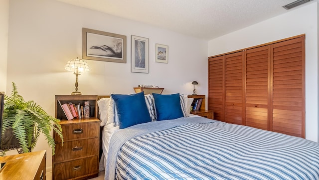 21596 Magdalena Ter, Boca Raton, FL 33433 - bedroom with a closet and a textured ceiling