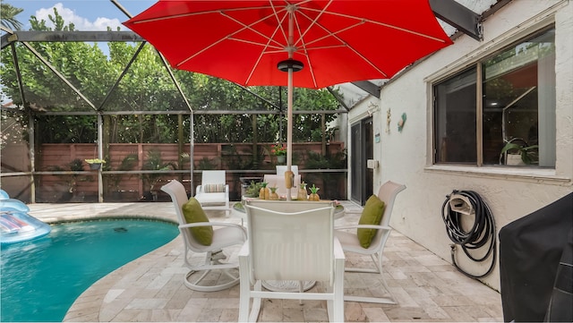 21596 Magdalena Ter, Boca Raton, FL 33433 - view of patio featuring an outdoor pool, glass enclosure, grilling area, and outdoor dining area