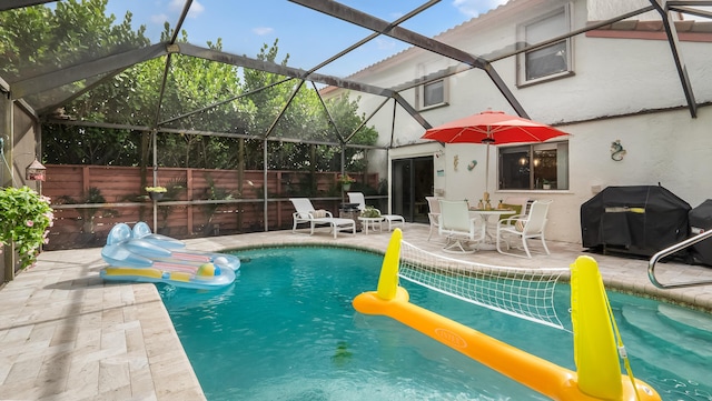 21596 Magdalena Ter, Boca Raton, FL 33433 - view of pool with a patio, grilling area, and glass enclosure