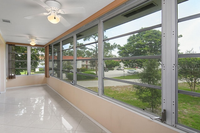 2600 SE Ocean Blvd Unit S15, Stuart, FL 34996 - unfurnished sunroom featuring ceiling fan and healthy amount of natural light