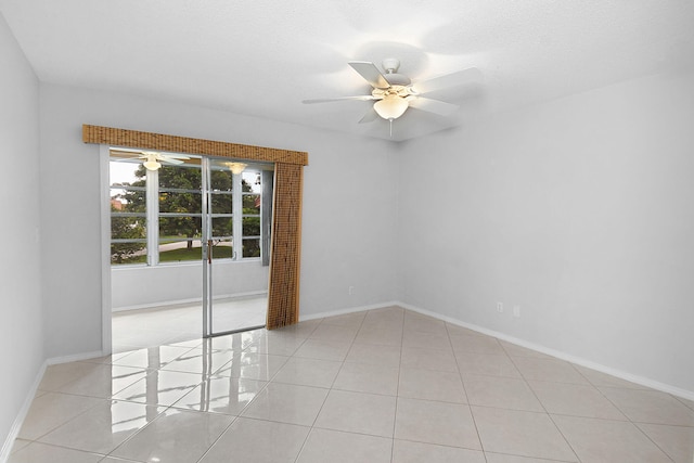 2600 SE Ocean Blvd Unit S15, Stuart, FL 34996 - tiled empty room with a ceiling fan