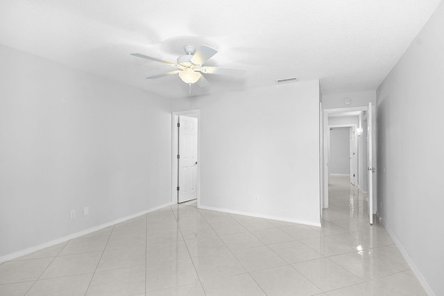 2600 SE Ocean Blvd Unit S15, Stuart, FL 34996 - spare room with ceiling fan and light tile patterned floors