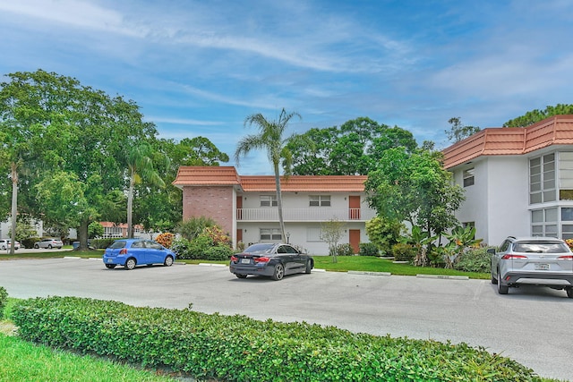 2600 SE Ocean Blvd Unit S15, Stuart, FL 34996 - view of property featuring uncovered parking