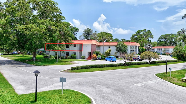 2600 SE Ocean Blvd Unit S15, Stuart, FL 34996 - view of asphalt road featuring street lighting