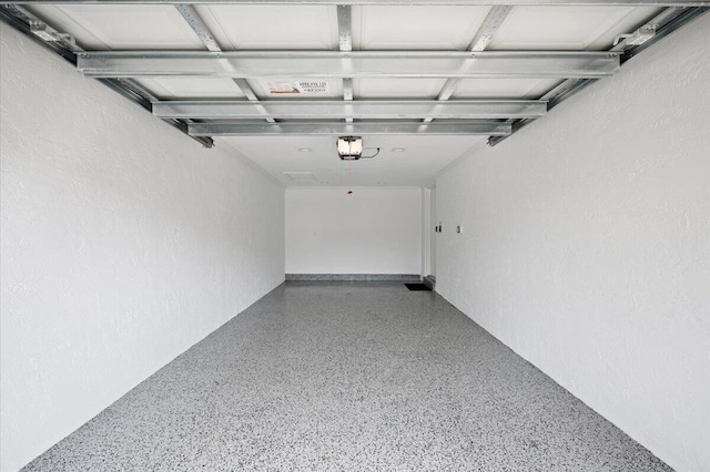 402 Sea Oats Dr Unit F, Juno Beach, FL 33408 - garage featuring a garage door opener