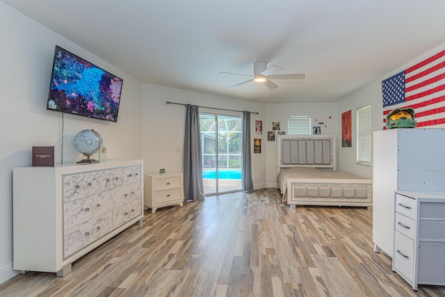 16330 Wiltshire Dr E, Loxahatchee, FL 33470 - bedroom with light wood-style flooring, access to outside, and ceiling fan