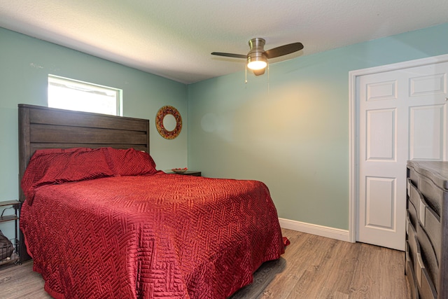 16330 Wiltshire Dr E, Loxahatchee, FL 33470 - bedroom with wood finished floors and ceiling fan