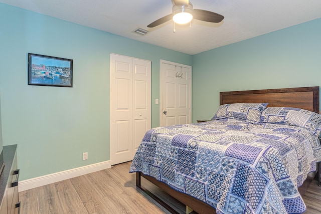 16330 Wiltshire Dr E, Loxahatchee, FL 33470 - bedroom with wood finished floors, a closet, and a ceiling fan