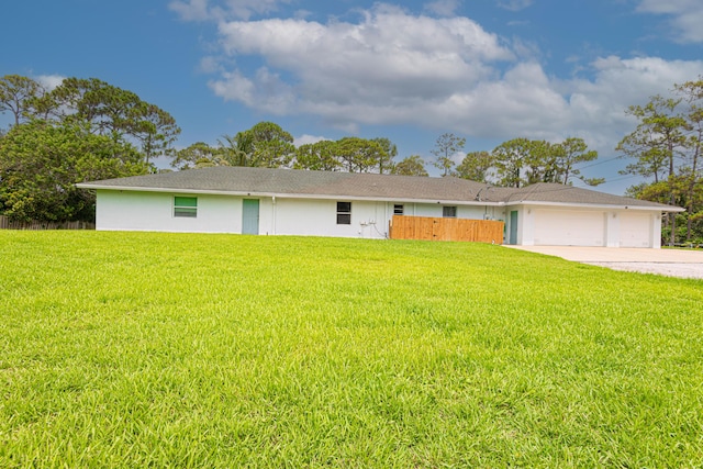 16330 Wiltshire Dr E, Loxahatchee, FL 33470 - ranch-style house with driveway, a garage, and stucco siding