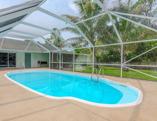 16330 Wiltshire Dr E, Loxahatchee, FL 33470 - view of swimming pool featuring a fenced backyard, a lanai, and a patio