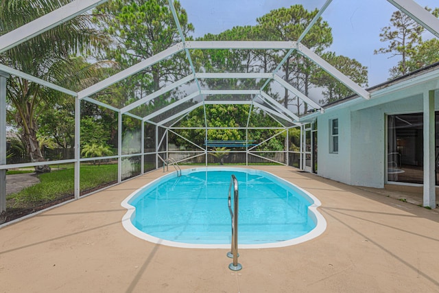 16330 Wiltshire Dr E, Loxahatchee, FL 33470 - swimming pool with a patio and a lanai