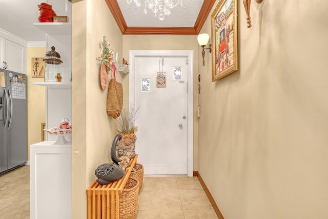 5780 W Fernley Dr Unit 101, West Palm Beach, FL 33415 - doorway to outside with ornamental molding, light tile patterned floors, a chandelier, and baseboards