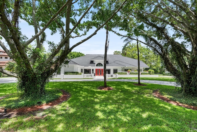 8076 Twin Lake Dr, Boca Raton, FL 33496 - view of front of home with a front yard
