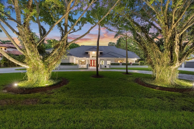 8076 Twin Lake Dr, Boca Raton, FL 33496 - view of front of house featuring a lawn
