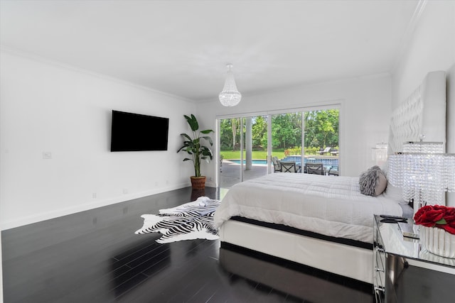 8076 Twin Lake Dr, Boca Raton, FL 33496 - bedroom featuring access to exterior, wood finished floors, crown molding, and baseboards