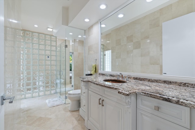 8076 Twin Lake Dr, Boca Raton, FL 33496 - full bathroom with a shower stall, vanity, toilet, tile walls, and recessed lighting